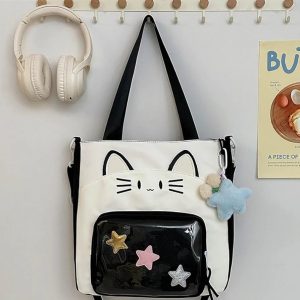 Ladies Kitty Bag – Cute Multi‑Pocket Tote Made from durable fabric with dual handles and a spacious main compartment, this bag is perfect for carrying books, accessories, or daily essentials. Its cute design makes it ideal for casual outings, college, or gifting.